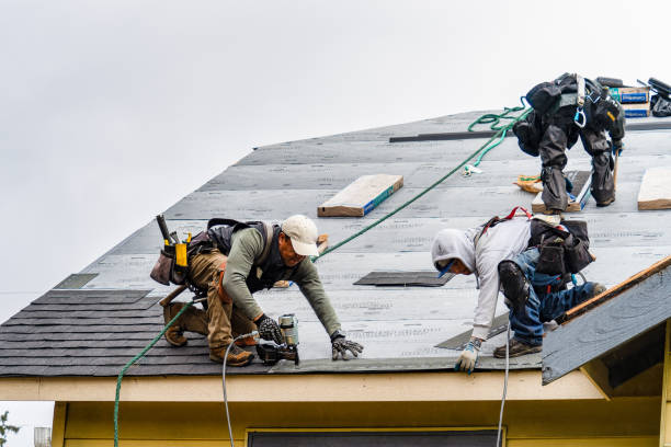 Professional Gutter Installation technician working in Oakland, MO